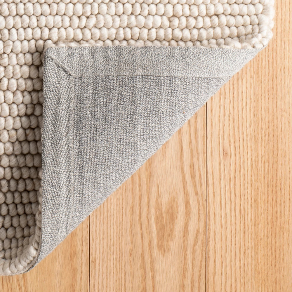 Niels Handwoven Woolviscose Rug | Latte